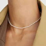 collier tendance perles acier