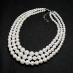 gros collier de perles trois rangs